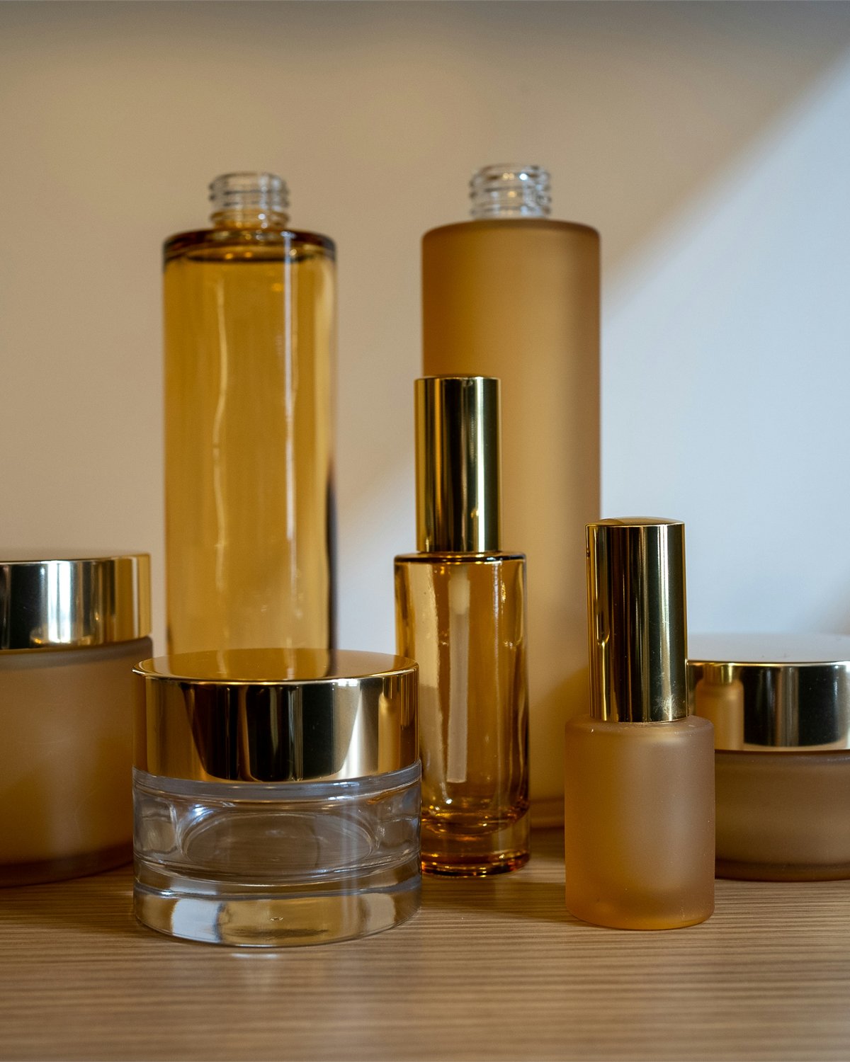 An assortment of unbranded skincare bottles